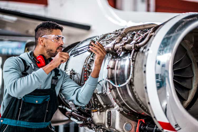 Aircraft mechanic in the hangar