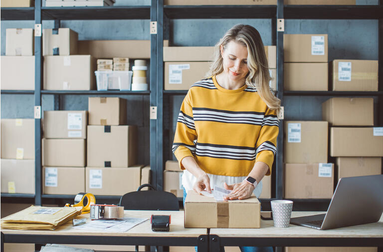 Mature woman running online store