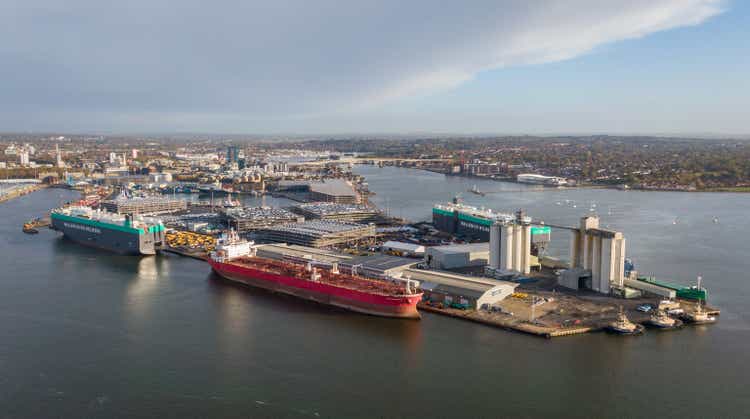 A tanker held up by stowaways off Britain's south coast is moving into port