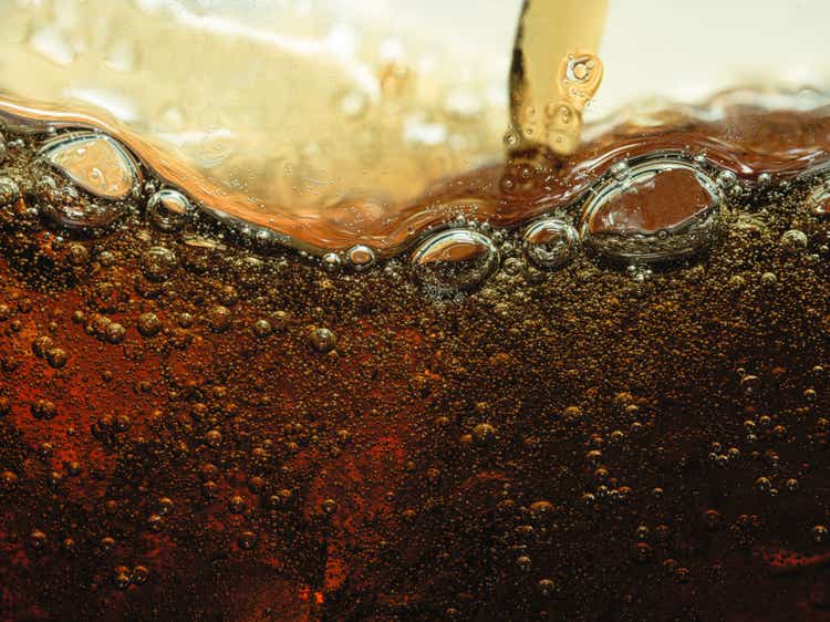 Close up soda pour