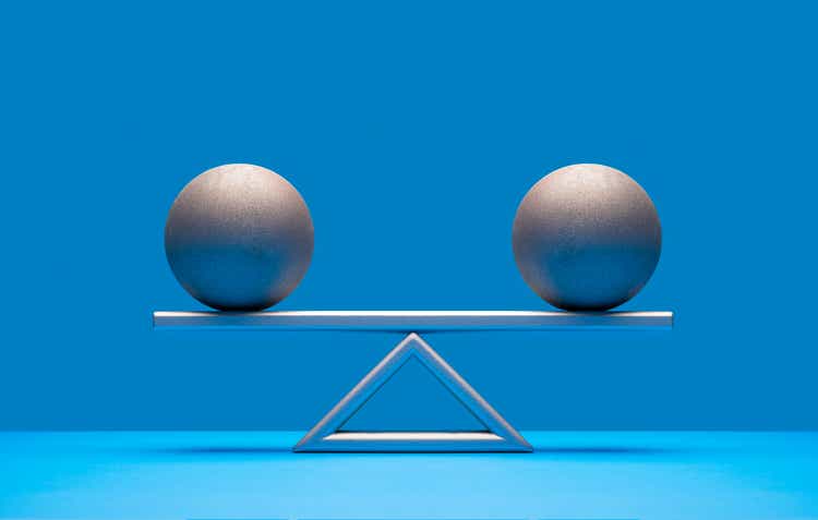 Balls balancing on scale