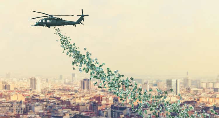 helicopter flies over the city and distributes dollars money to everyone.