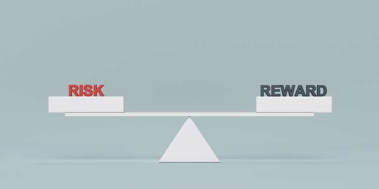 Risk and reward seesaw balance digital concept