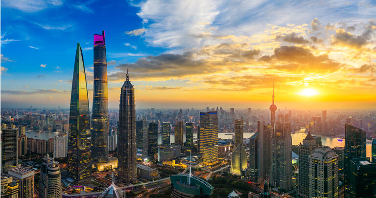 Aerial view of Shanghai skyline and cityscape at sunset.