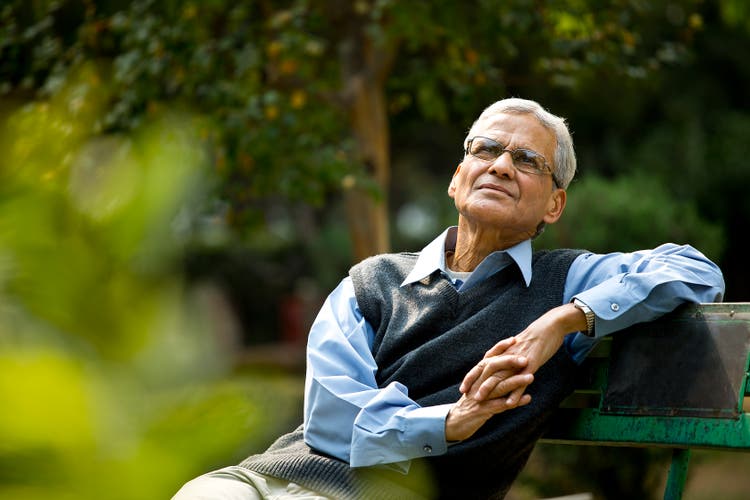 Thoughtful senior man at park