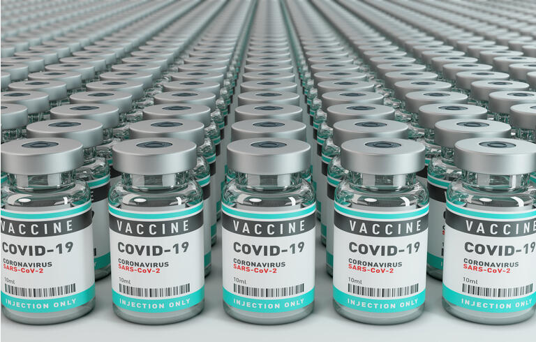 Vaccine Covid-19 Corona Virus Concept with large group of bottles vials.