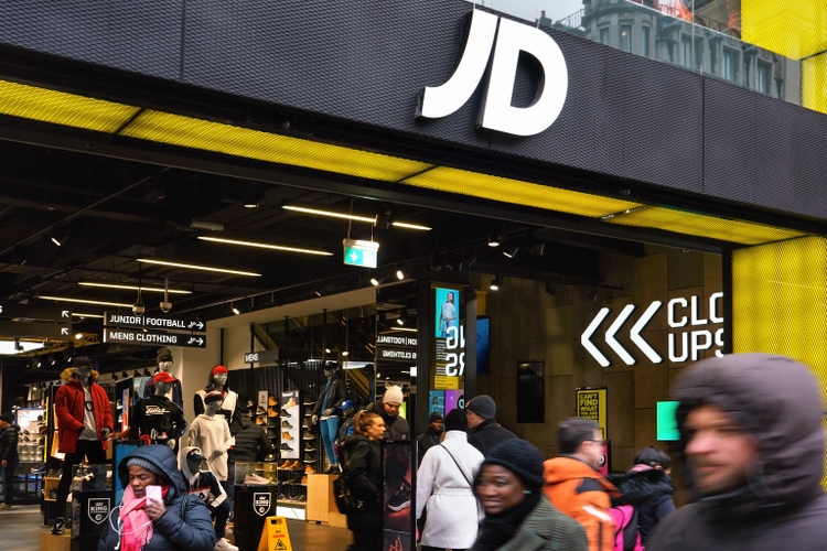 White J D letters logo on their Oxford street branch