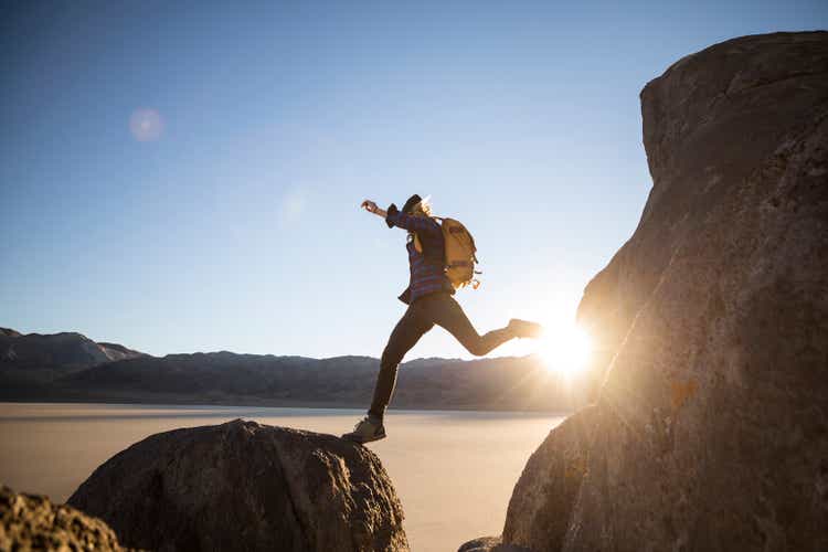 A woman hiking in the Racetracks region of death valley