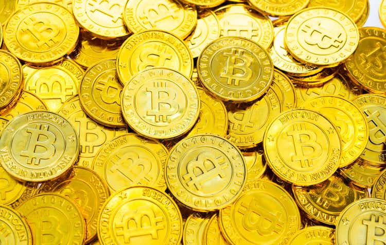 Heap of golden bitcoins background