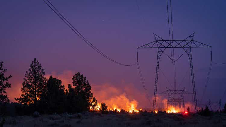 Forest fire under power transmission lines