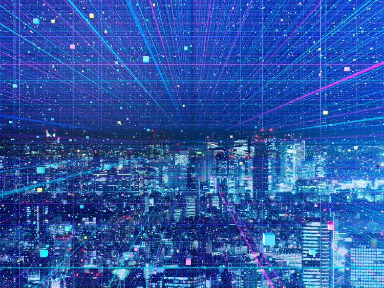 Data particle above the city at night in cyber space