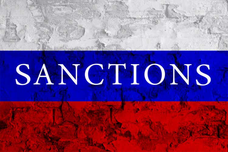 Economy sanctions. Inscription sanctions on Russia flag.