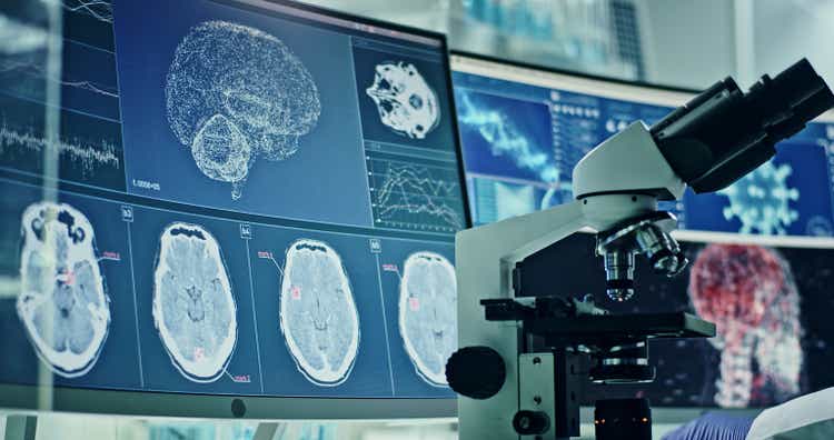 Futuristic laboratory equipment - coronavirus testing. Studying virus damage to the brain