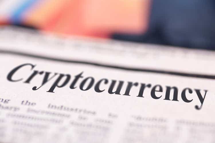 Cryptocurrency written newspaper