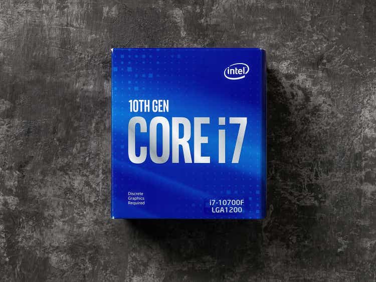 Intel Core i7-10700F processor blue box on a dark background. 10th gen Intel CPU. Modern desktop computer hardware components for build and upgrade. Top view.