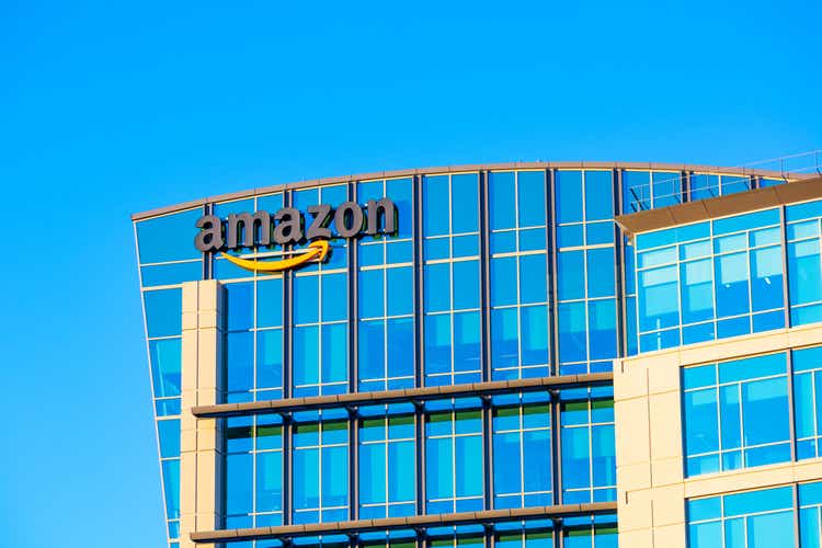 Amazon logo, sign on the glass exterior of company office