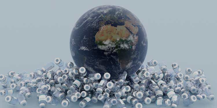 planet earth over many canisters of coronavirus vaccine