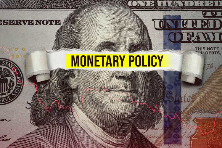 Torn bills revealing Monetary Policy words