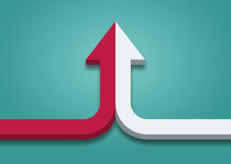 Bent arrow of two red and white ones merging on turquoise blue background.