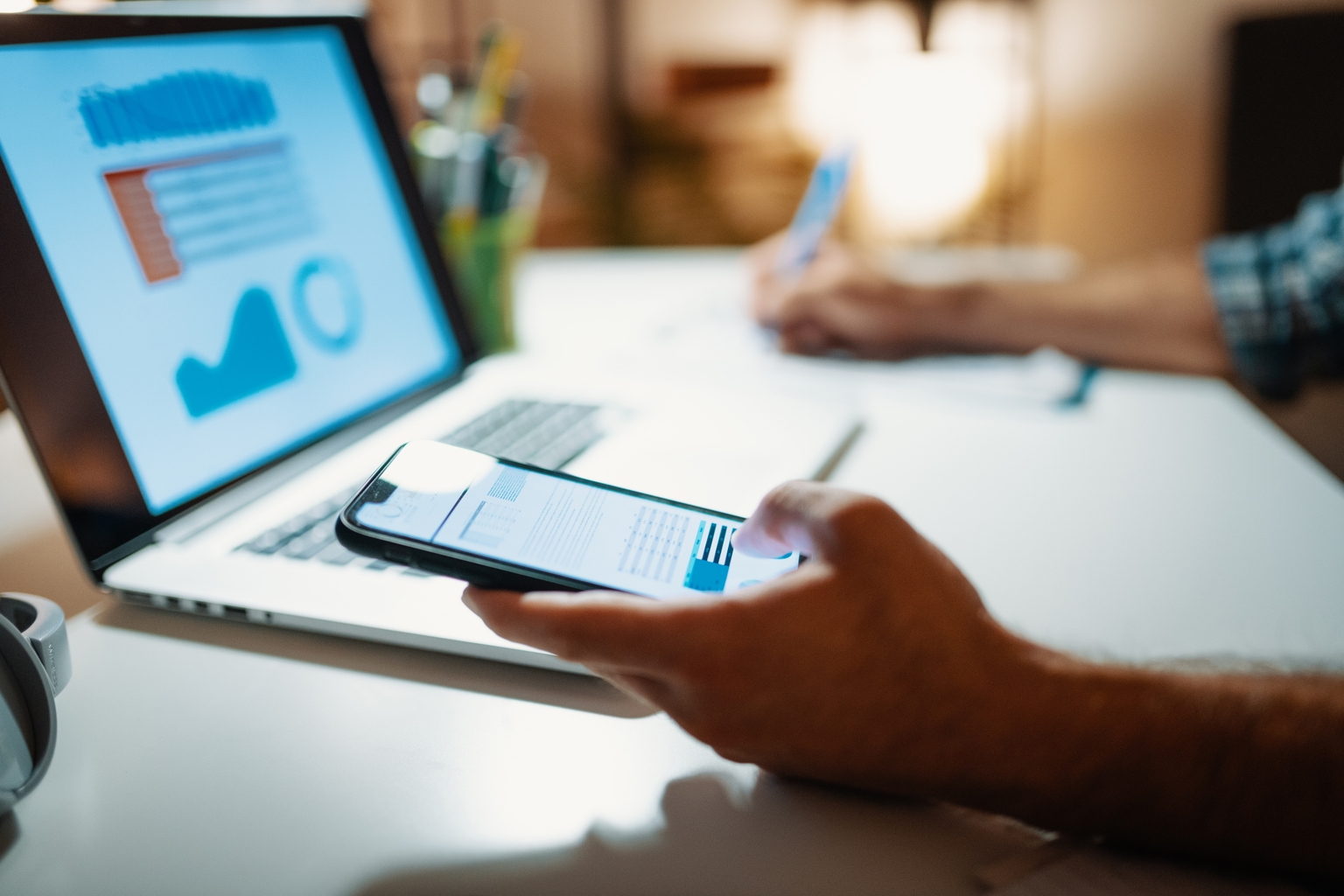 Millennial man investing stock market analysis during trading cryptocurrency on laptop