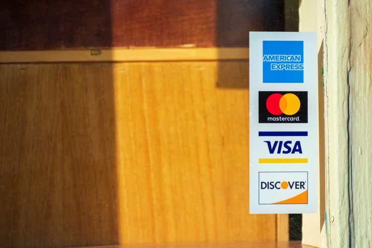 American Express, MasterCard, VISA, Discover decals on restaurant door