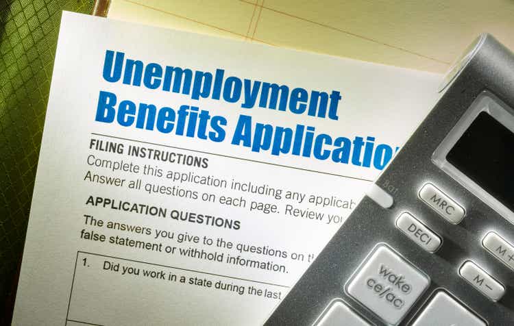 Unemployment Benefits Application with calculator on note pad