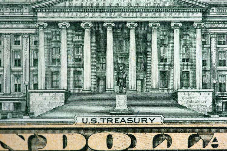 Detail of US $10 banknote depicting US Treasury