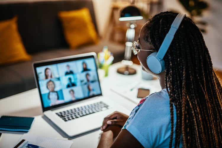 Group of unrecognizable international students having online meeting