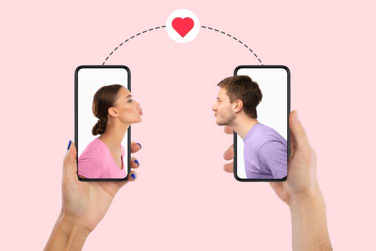 Young couple kissing using smartphones, creative collage