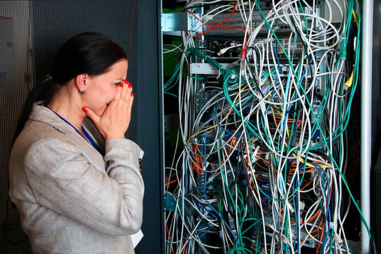 Female engineer trying to understand network mess