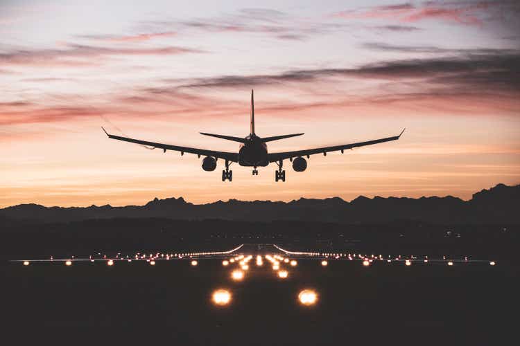 Aircraft landing at sunrise