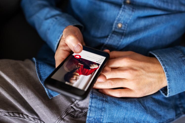 Man using mobile dating app