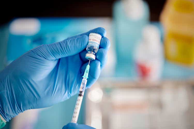 A Healthcare Worker Prepares a Dose of COVID-19 Vaccine.