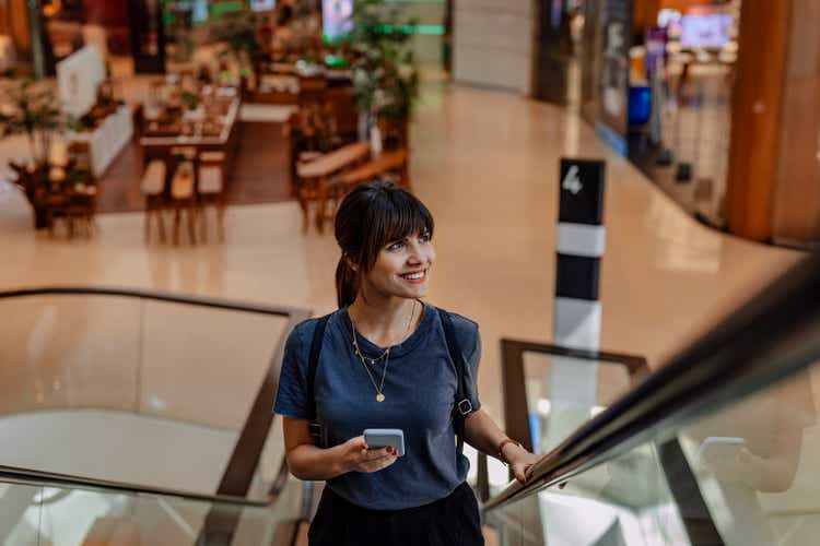 Women in Business: a Smiling Young Businesswoman on her Way to Work