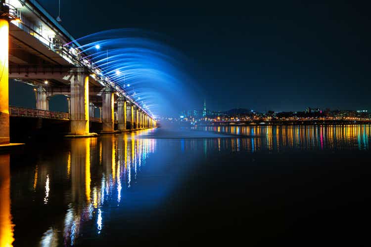 Banpo bridge water and light show with Seoul skyline in the background