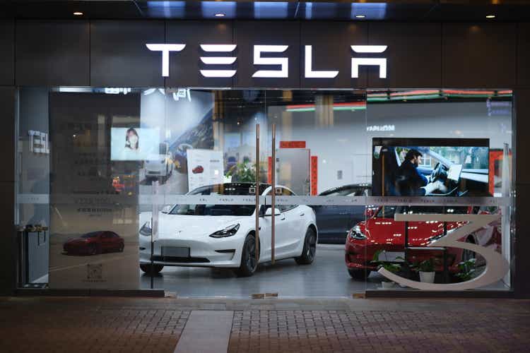 facade of Tesla store at night in China