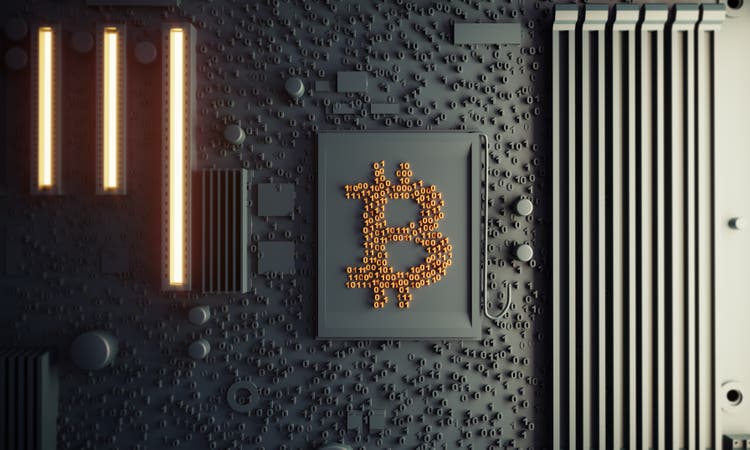 Bitcoin Concept On Motherboard