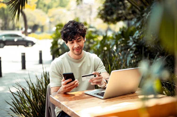 Young man shopping online