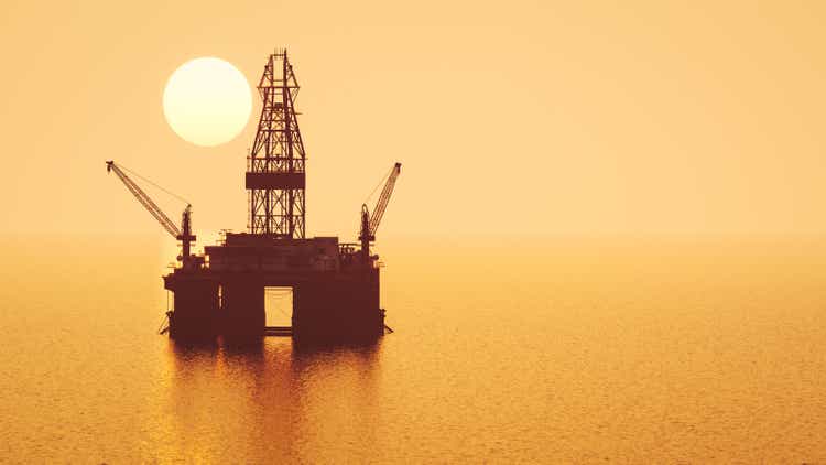 Offshore Oil Rig At Sunset