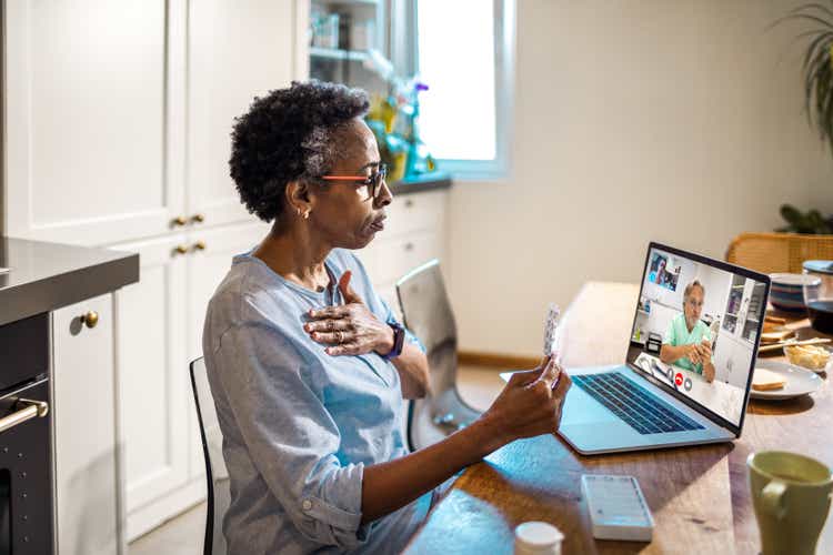 Senior woman on a video call with her doctor