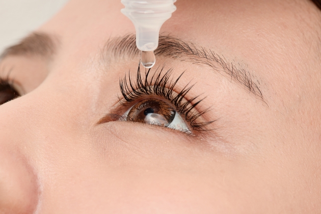 Close-up shot of moment eye drops fall