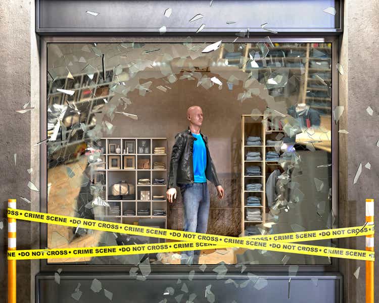 Destroyed boutique showcase broken on pieces of glass, crime tape beside and mannequin behind, concept of vandalism, theft, 3d illustration