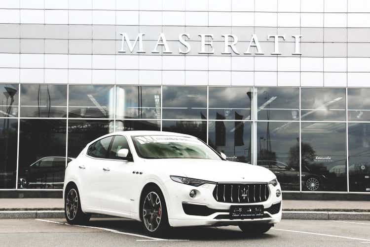 A luxury Maserati Levante car parked in the city.