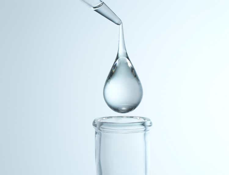 Close up droplet over flask