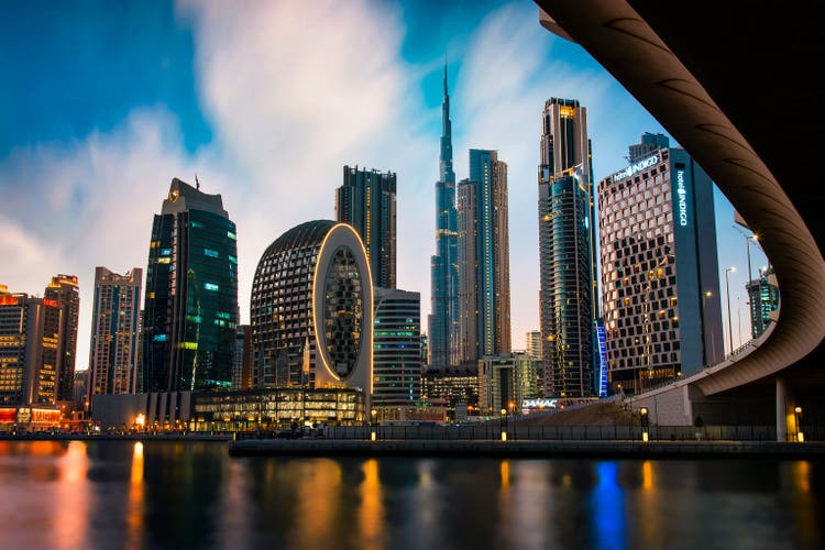 Crypto exchange OKX secures license to offer trading services in UAE - Seeking Alpha 2 Dubai skyline view from the Marasi marina in city Business bay downtown area in the UAE