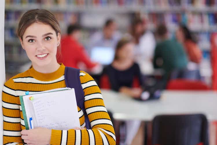 the student uses a notebook and a school library