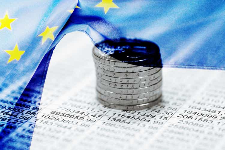 EU flag, spreadsheet and euro coins