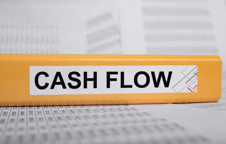 Cash flow statement on folder on office desk, cashflow