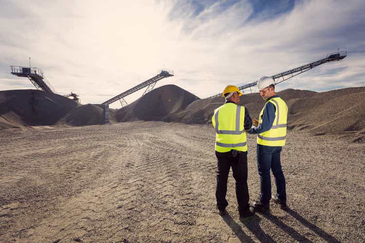 Back view of open-pit mine workers