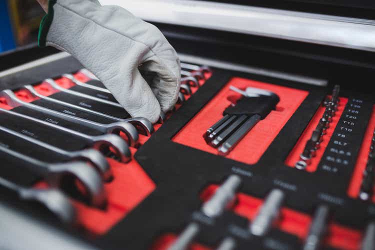 Set of the professional tools. Closeup of chrome wrench tools organized in box.